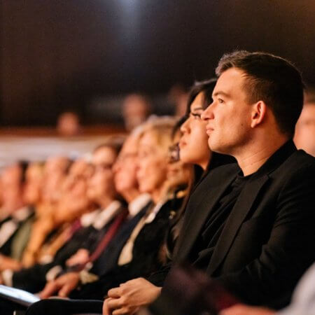Bronze - Patrons watching a production at The Dallas Opera