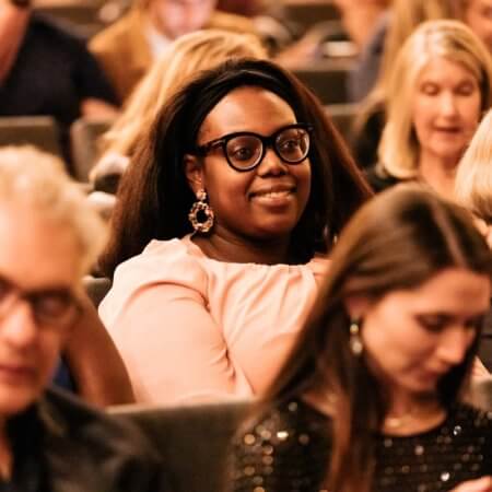 Friends - woman watching an opera production at The Dallas Opera