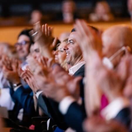 Inner Circle - Patrons applauding a production at The Dallas Opera