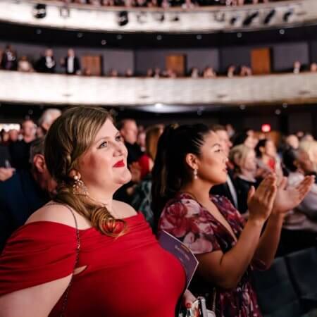 Silver - Patrons applauding a performance at The Dallas Opera