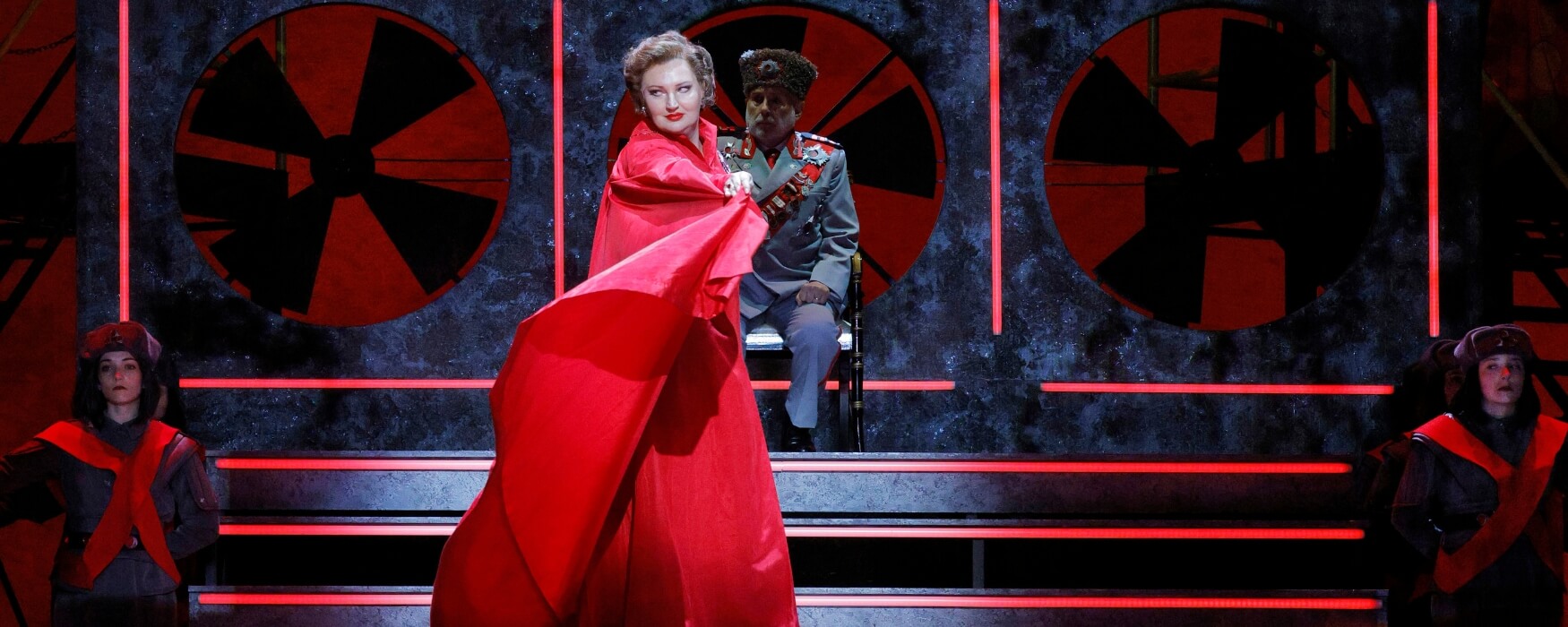 Woman on stage in a red dress - The Dallas Opera's 2026/2027 Season