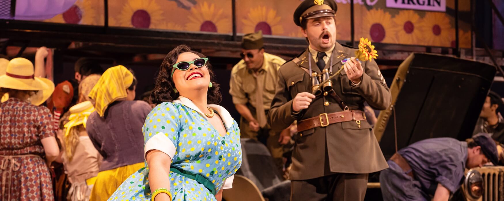 Woman and man singing in The Elixir of Love opera