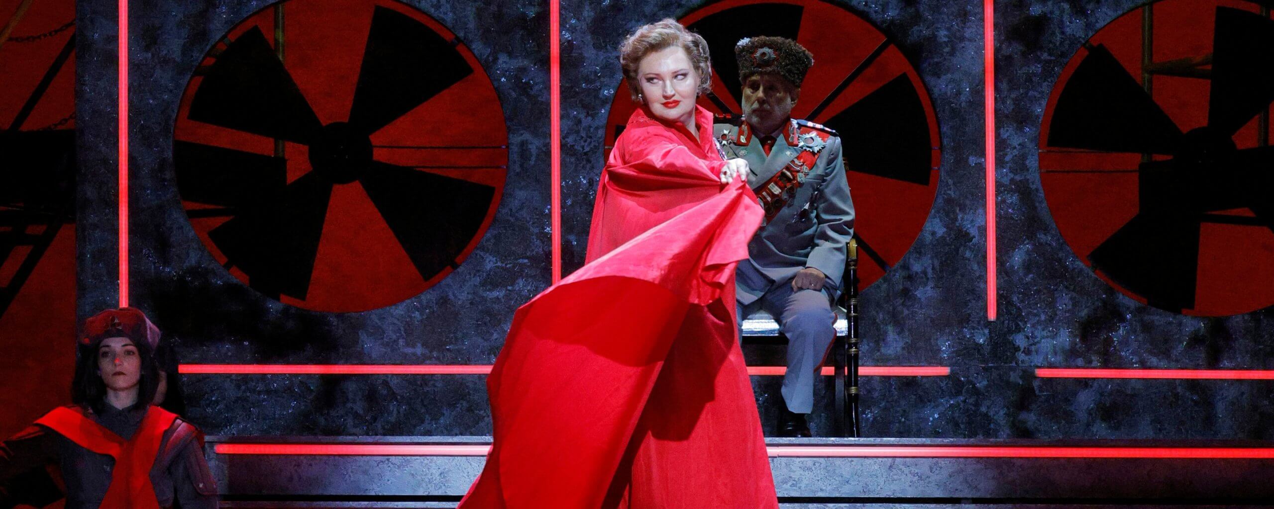Woman on stage in a red dress - The Dallas Opera's 2026/2027 Season
